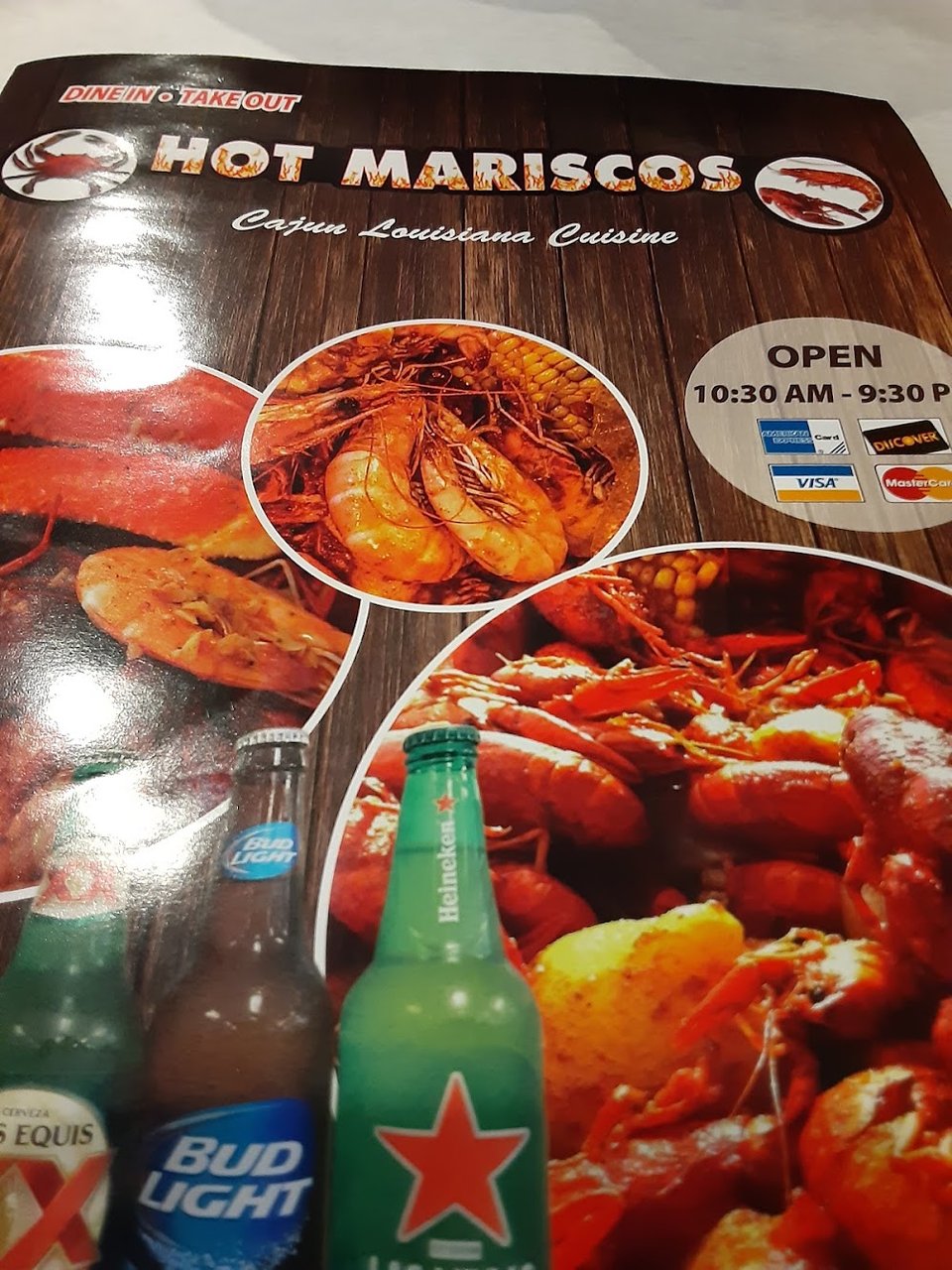 Printed menu with fried items and seafood.